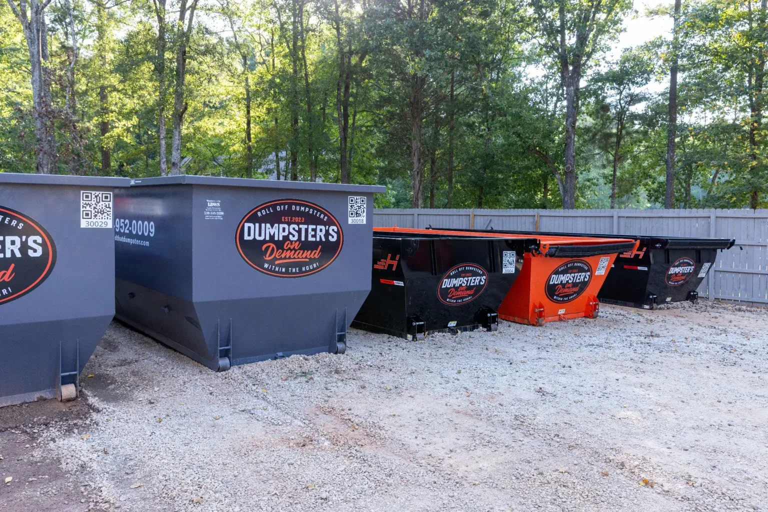 Dumpsters on Demand roll off dumpster delivered on a driveway